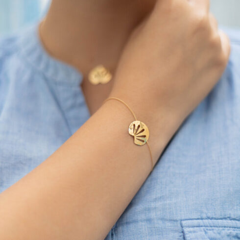 Bracelet en or fin avec forme coquillage de Sosol and Sea